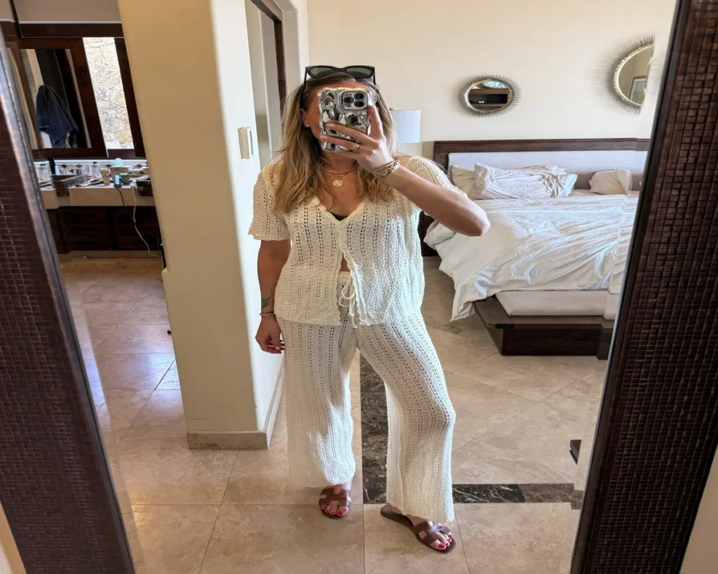 Woman in white knit outfit trying Amazon fashion finds