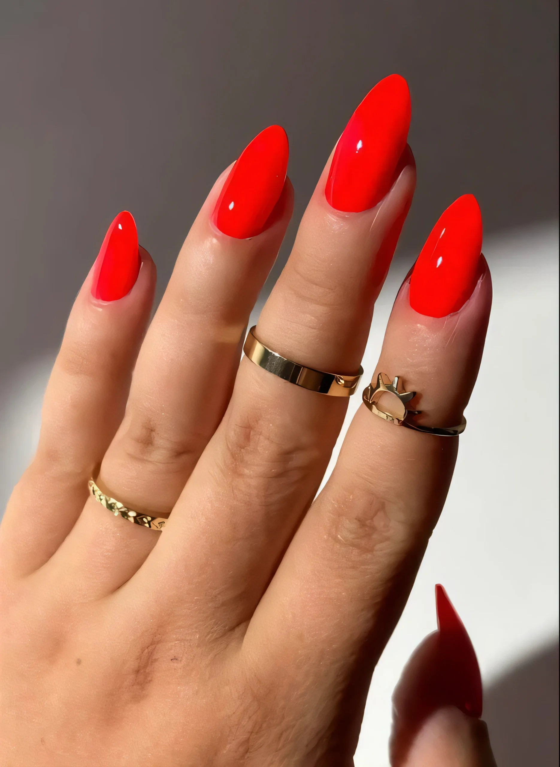 Neon green French tip nails on nude base