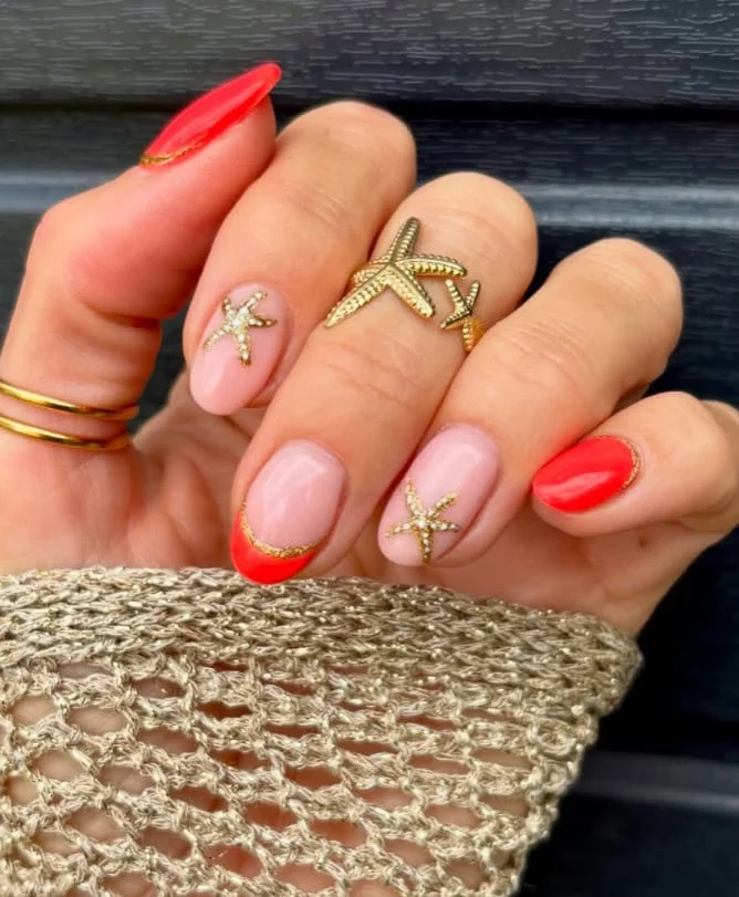 Colorful butterfly-inspired floral nails on nude base