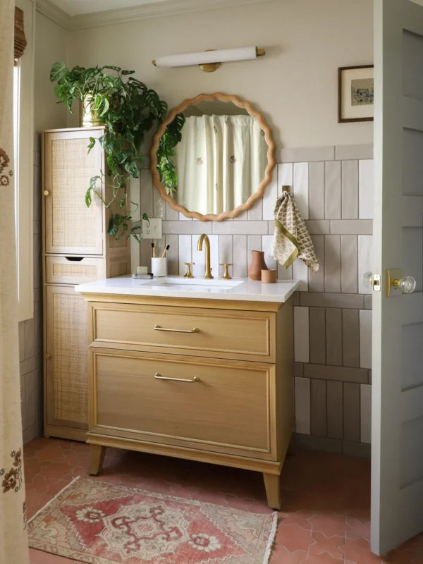 How We Saved a Cracked-Floor Bathroom With Two Tiles and One Paint Can