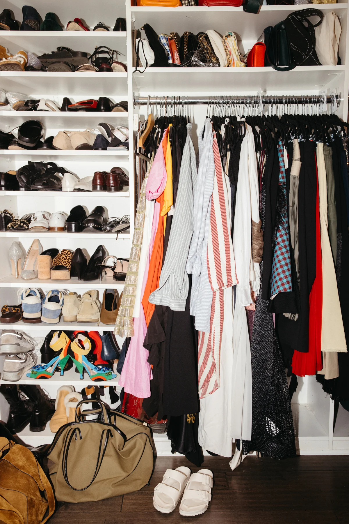 Curated fall capsule wardrobe essentials laid out together