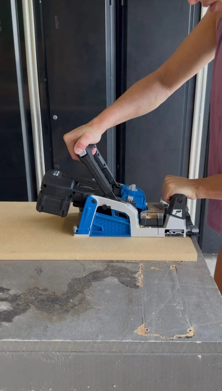 Drilling pocket holes into the bookcase side panels